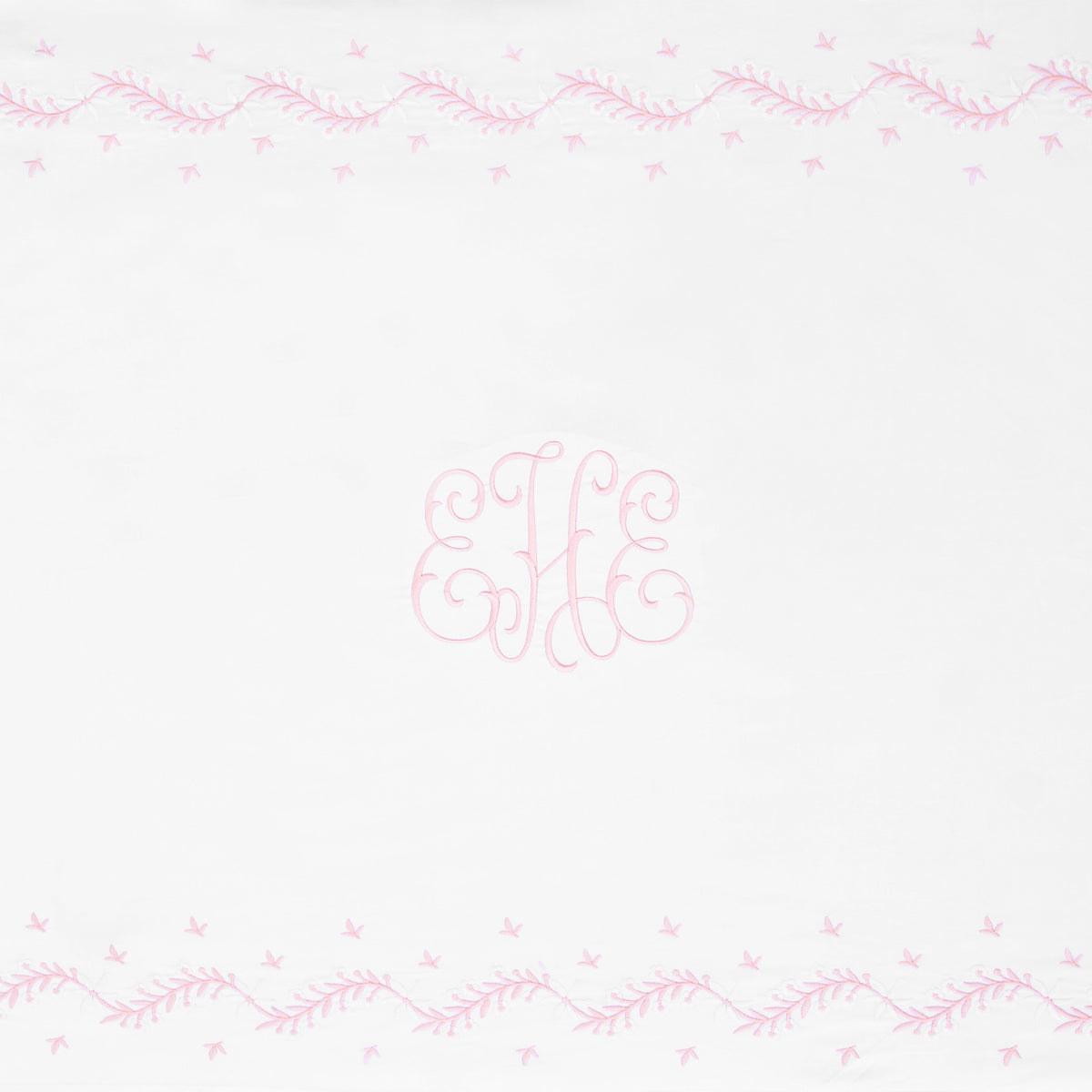 Little English classic nursery goods for baby, white crib sheet with simple light pink embroidery along the edges for baby