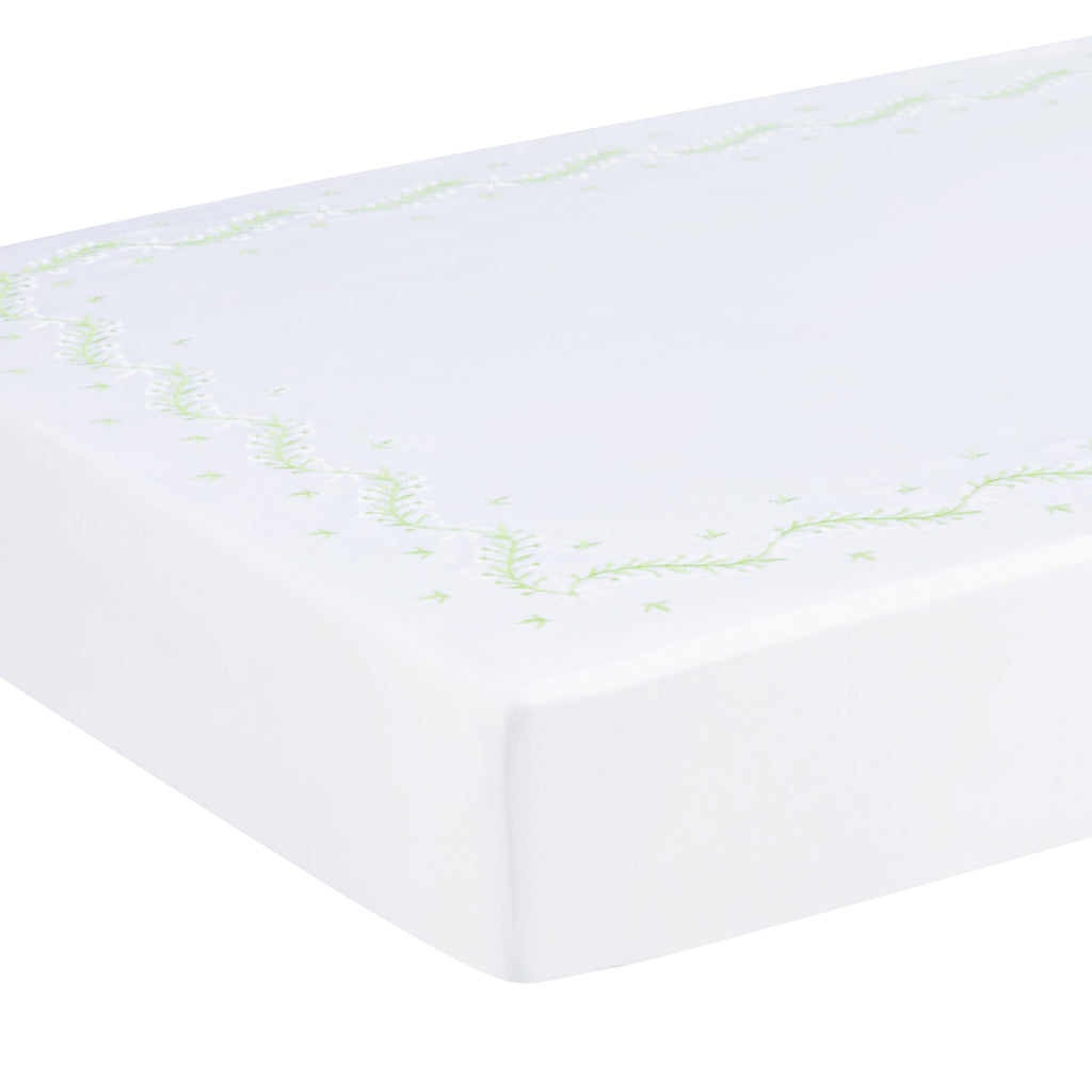Little English classic nursery goods for baby, white crib sheet with simple light green embroidery along the edges for baby