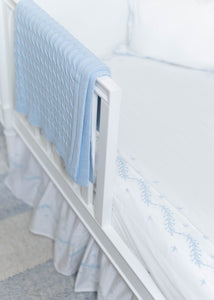 Little English classic nursery goods for baby, white crib sheet with simple light blue embroidery along the edges for baby