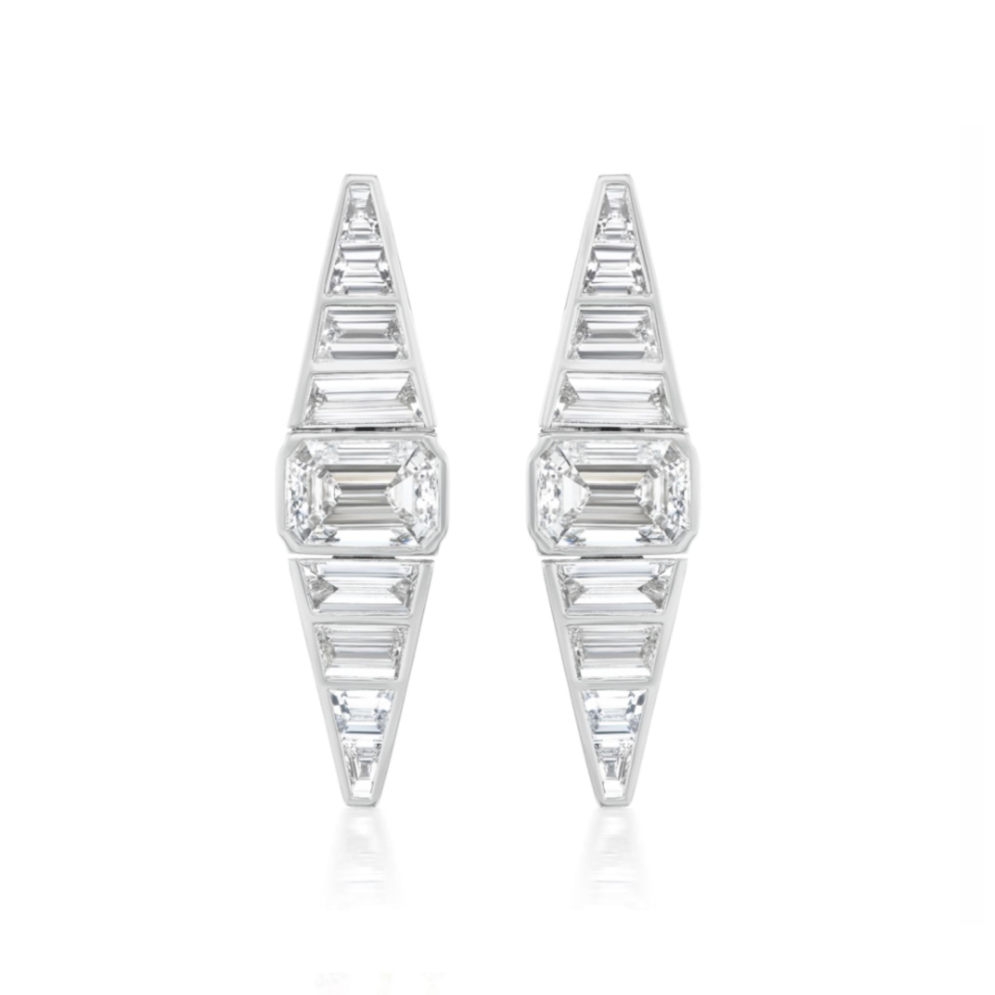 A pair of Emerald Cut Diamond Taper Earrings with trapezoid baguette diamonds in white gold, showcasing a modern, angular design on a white background.