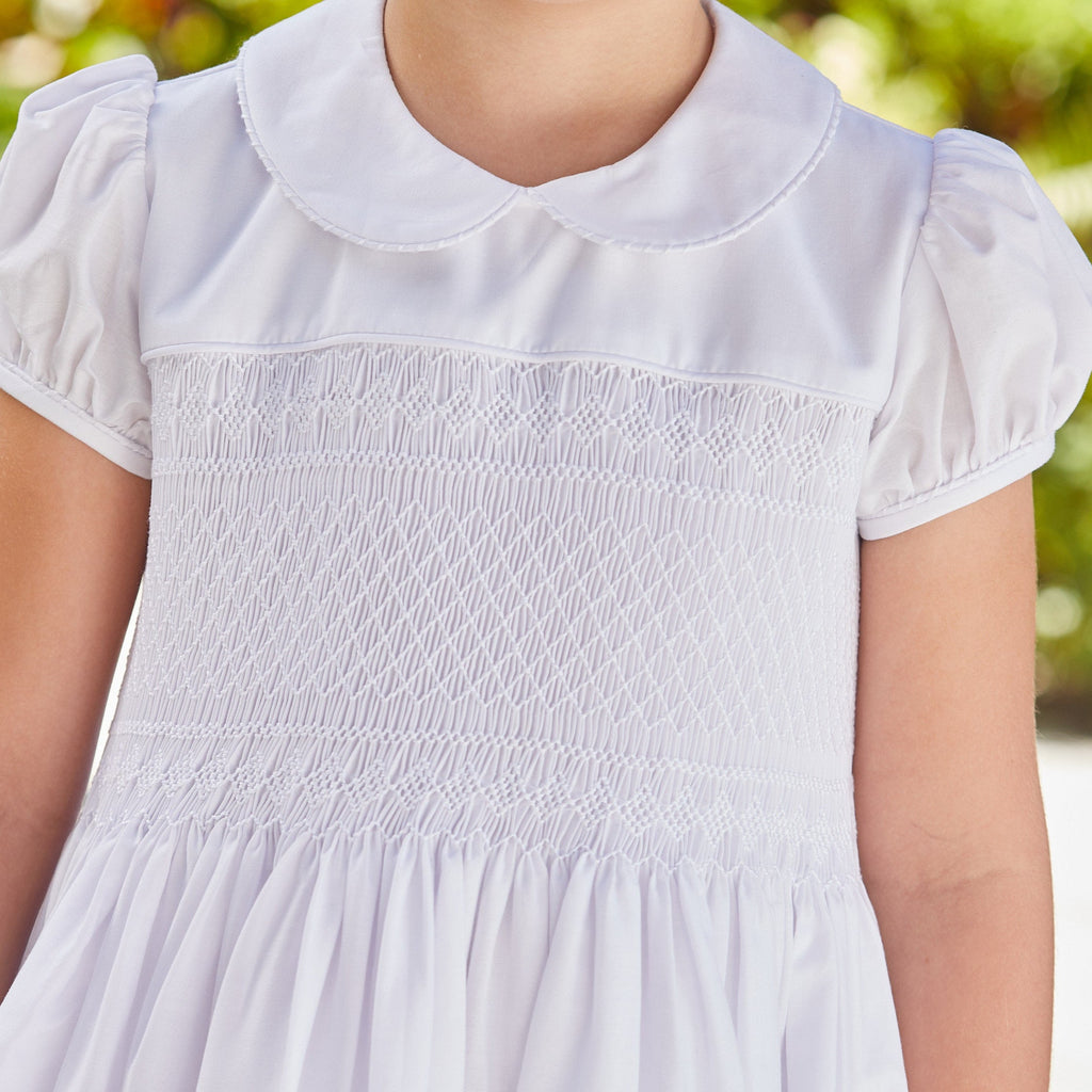Little English traditional girl's clothing, classic smocked dress for toddler girls with peter pan collar and sash, little girl's flower girl dress with white smocking