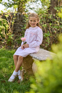 Little English traditional children's clothing. Long sleeve pink and green Windemere floral dress with ruffled collar and fixed bow detail for little girls