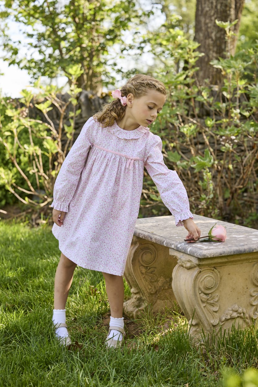 Little English traditional children's clothing. Long sleeve pink and green Windemere floral dress with ruffled collar and fixed bow detail for little girls