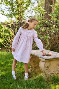 Little English traditional children's clothing. Long sleeve pink and green Windemere floral dress with ruffled collar and fixed bow detail for little girls