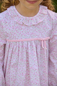 Little English traditional children's clothing. Long sleeve pink and green Windemere floral dress with ruffled collar and fixed bow detail for little girls