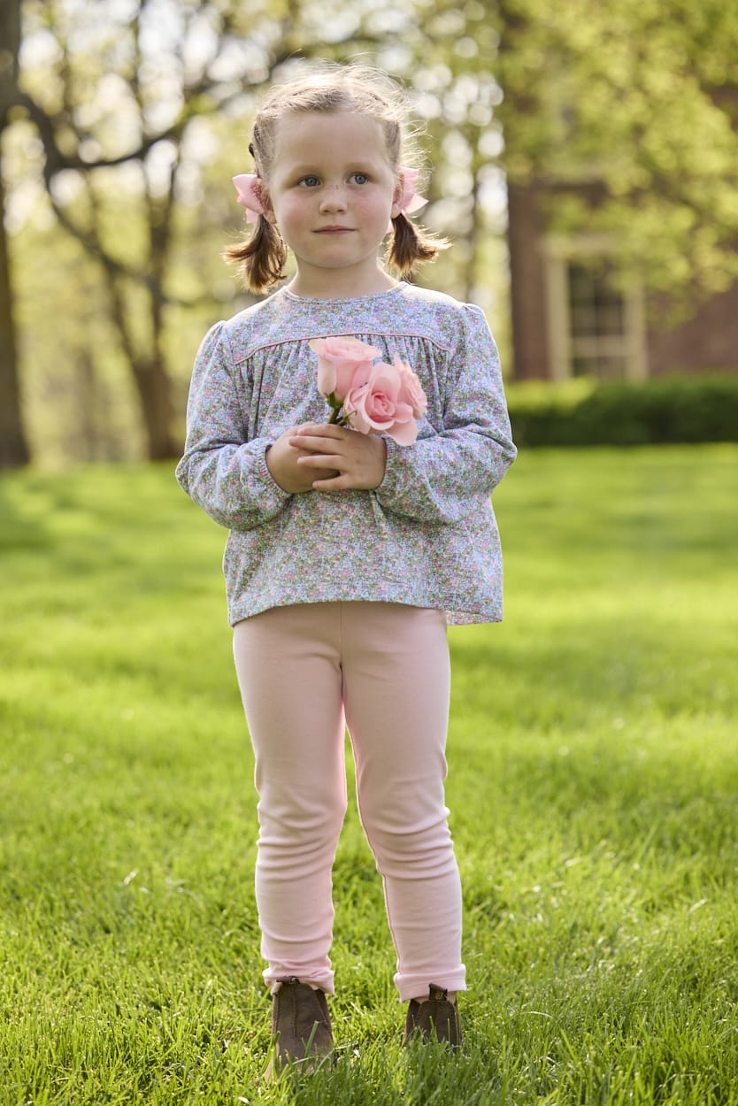 Little English traditional children's clothing. Long sleeve pink, aqua, and green Fondren Floral cotton knit top with pink piping detail for little girls. Paired with classic light pink leggings.