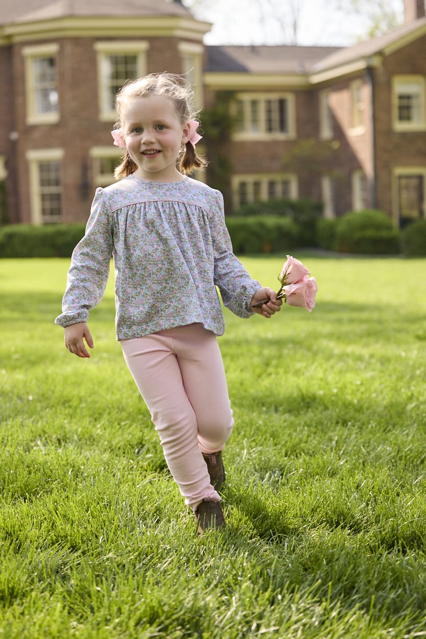 Little English traditional children's clothing. Long sleeve pink, aqua, and green Fondren Floral cotton knit top with pink piping detail for little girls. Paired with classic light pink leggings.