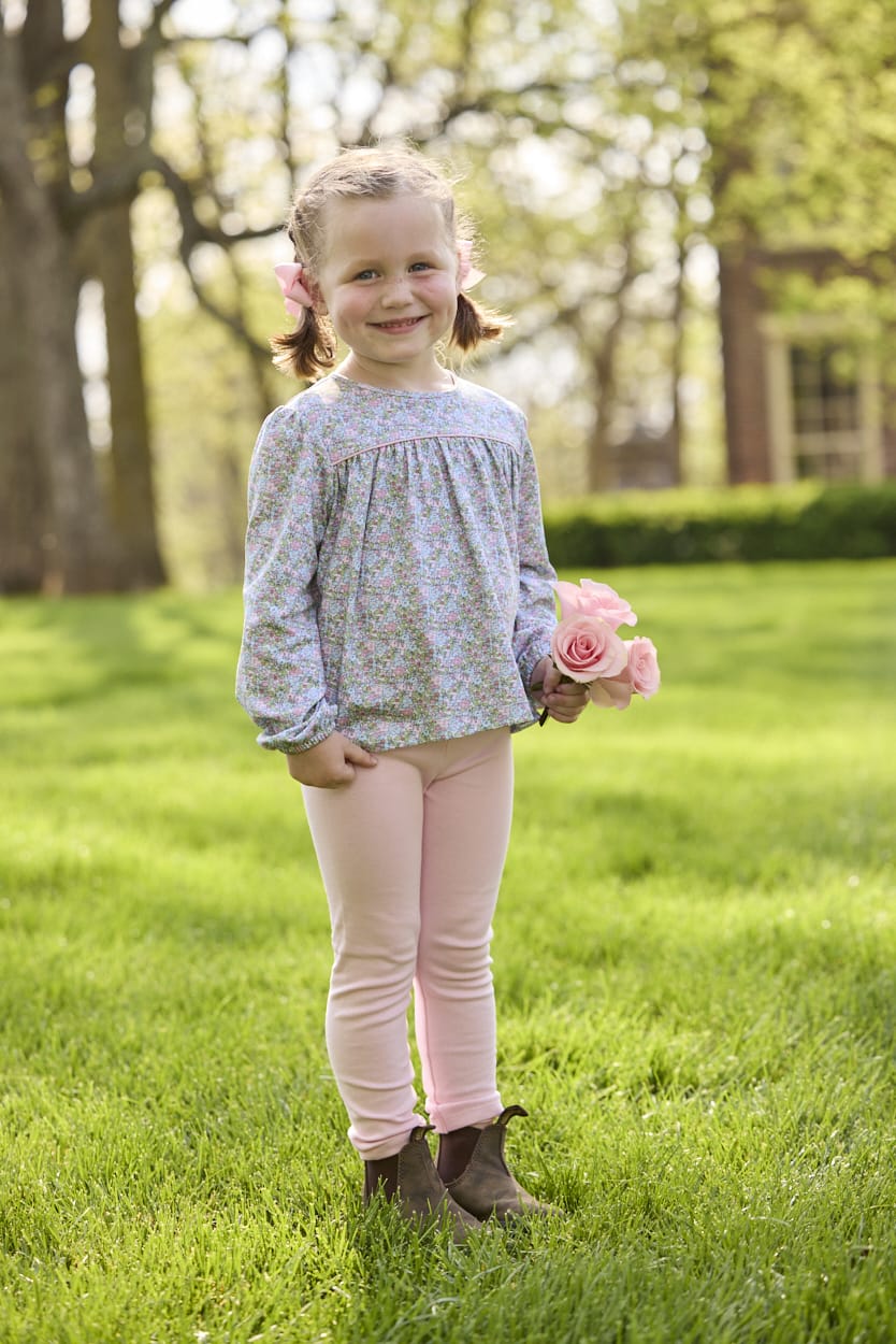 Little English traditional children's clothing. Long sleeve pink, aqua, and green Fondren Floral cotton knit top with pink piping detail for little girls. Paired with classic light pink leggings.