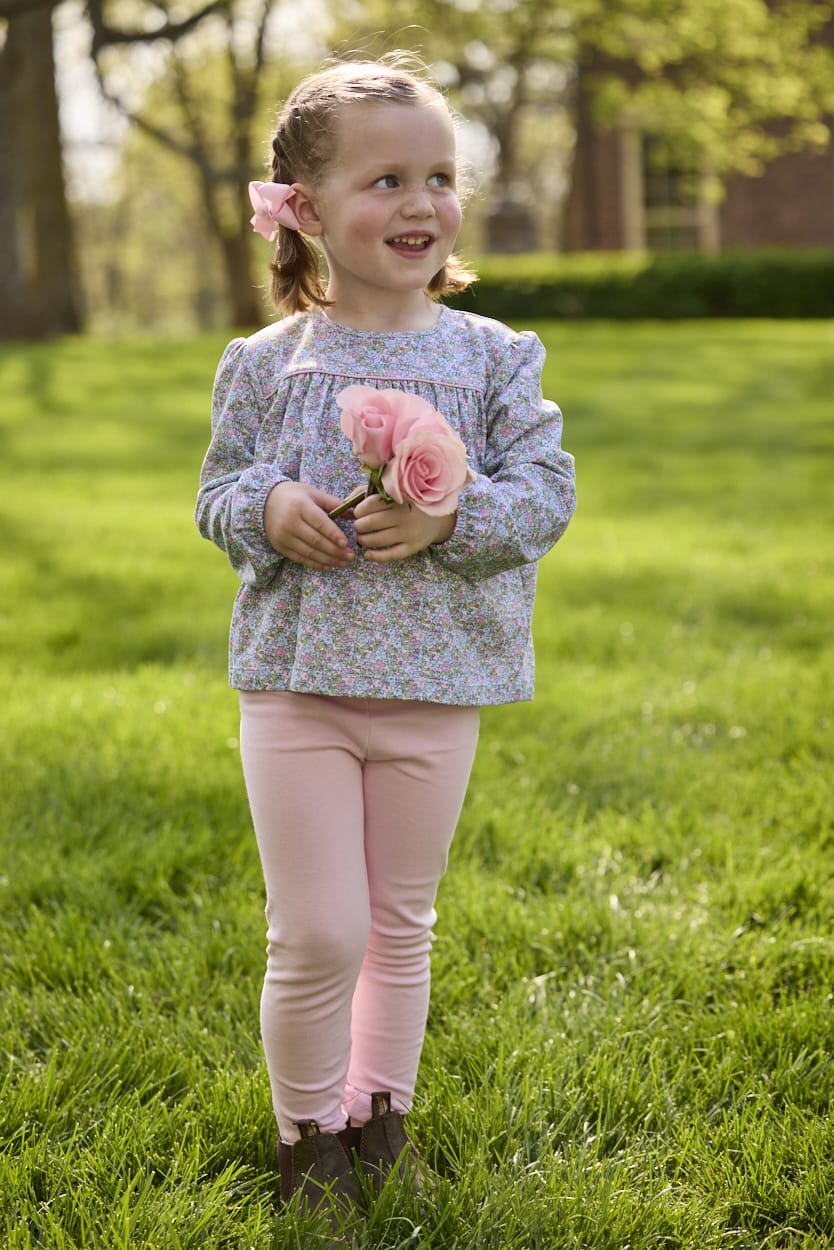 Little English traditional children's clothing. Long sleeve pink, aqua, and green Fondren Floral cotton knit top with pink piping detail for little girls. Paired with classic light pink leggings.