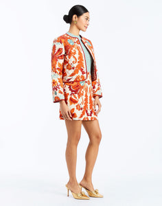 Side - Este Quilted Jacket in Calypso Waltz is a reversible quilted cotton jacket with piping and patch pockets.