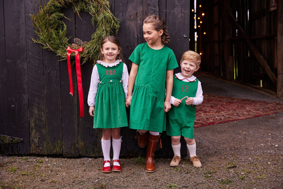 classic childrens clothing girls evergreen jumper with scallop details and wooden buttons