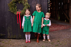 classic childrens clothing girls evergreen jumper with scallop details and wooden buttons