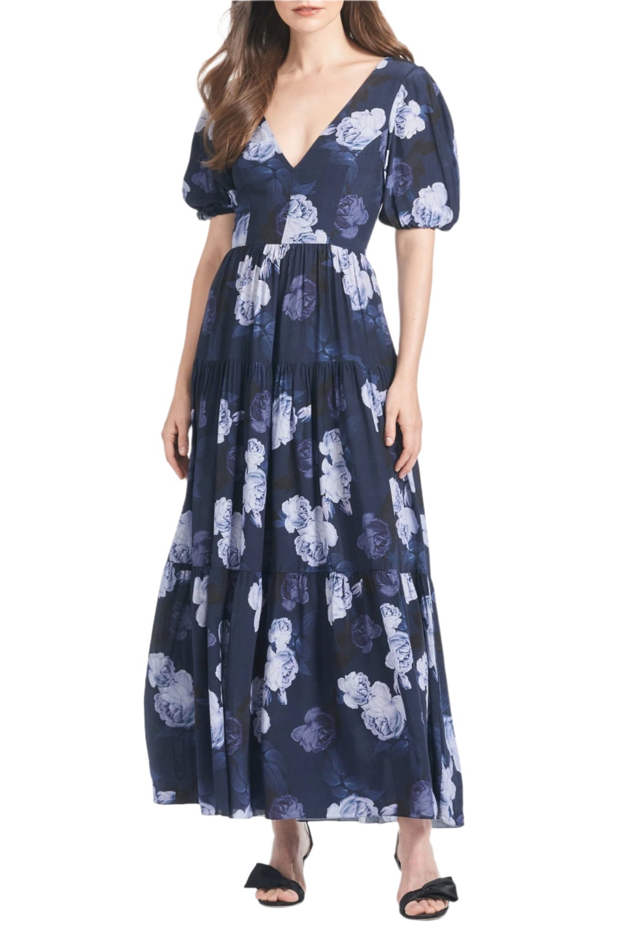 Front view of Carina Dress in Midnight Glacial Rose with V-neck, puff sleeves, and floral midi skirt on a model