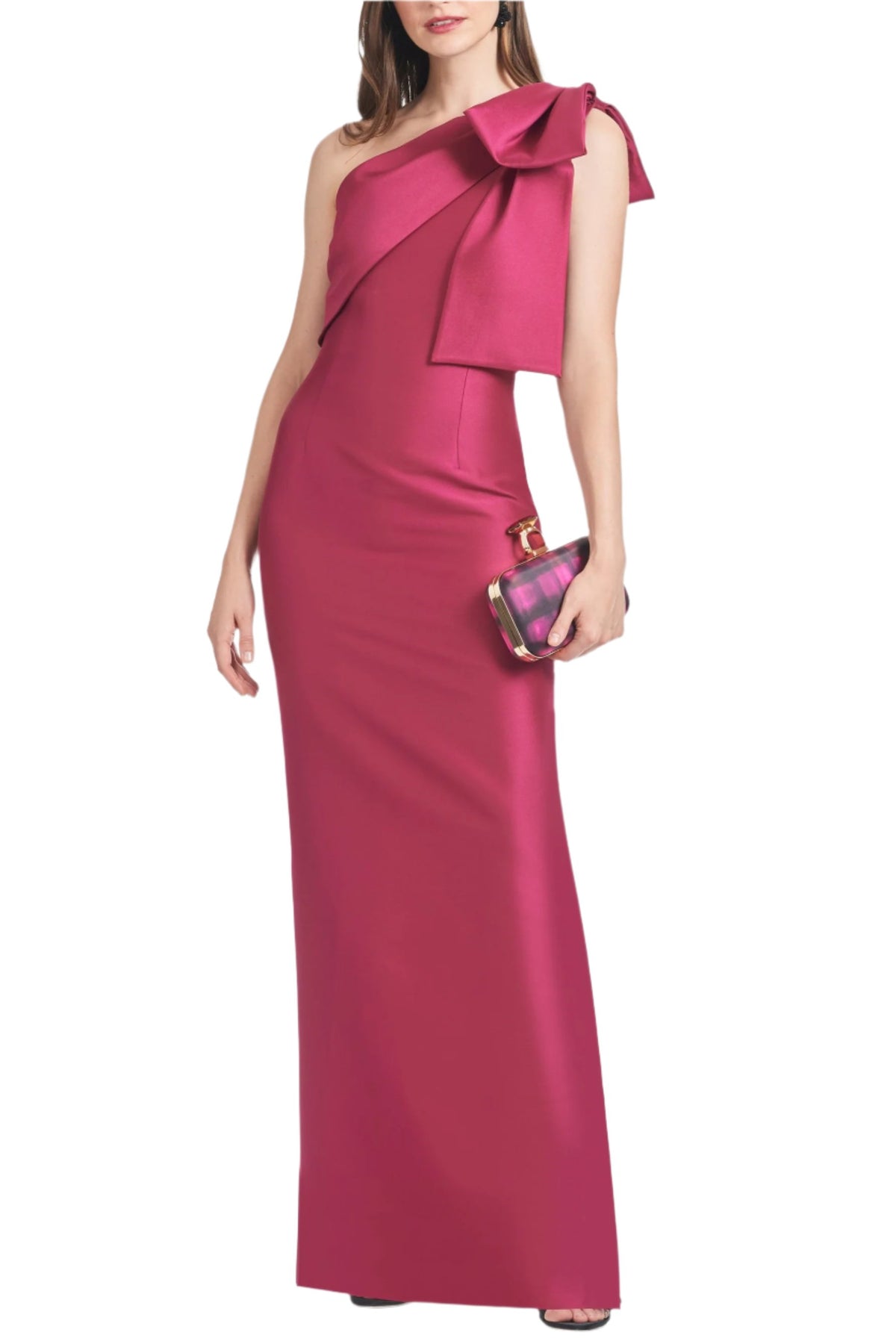 Front three-quarter view of Bonnie Gown in Rhodolite showcasing asymmetric one-shoulder silhouette and oversized bow on white background