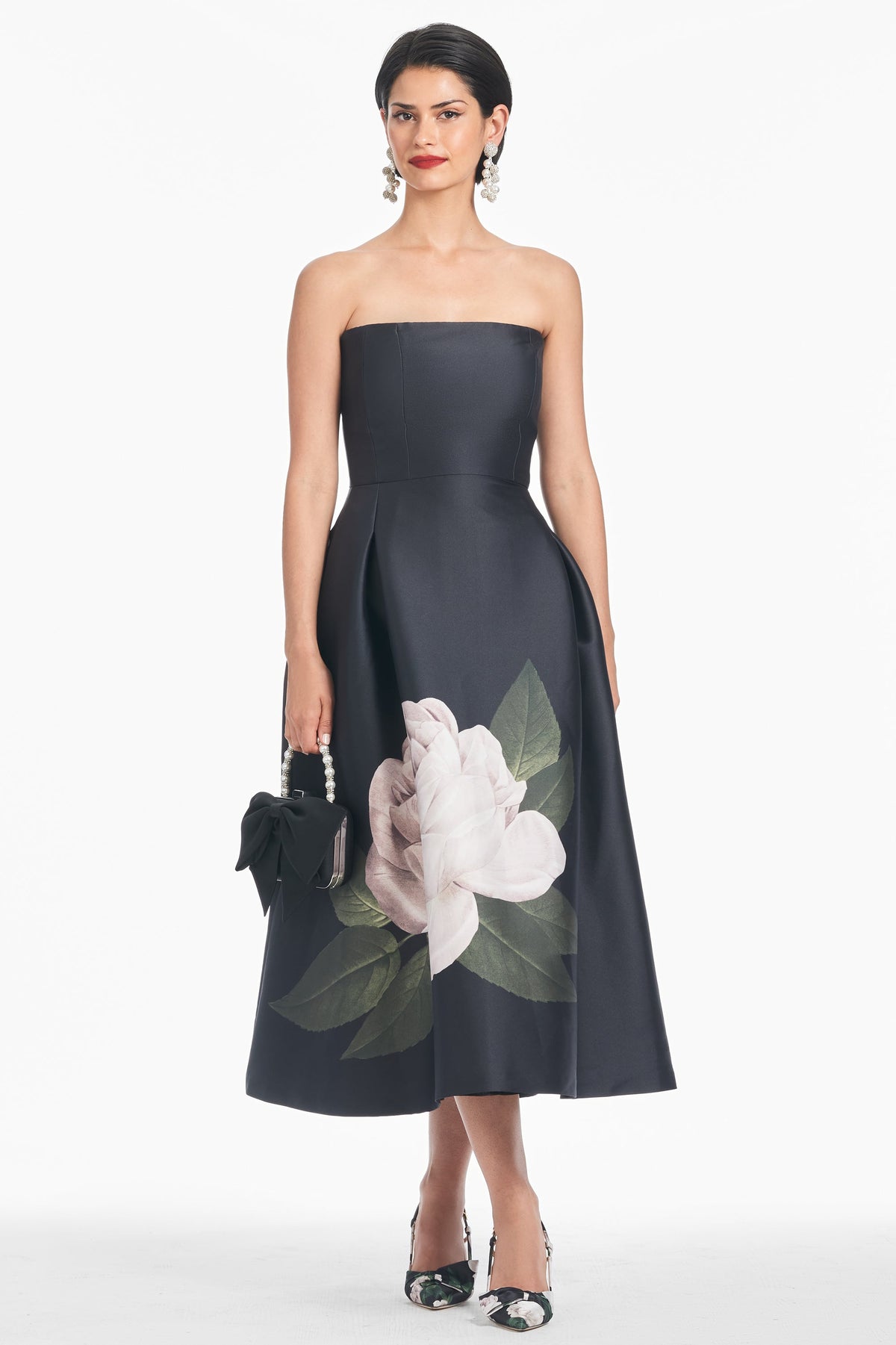Front view of Shay Dress in Blooming Rose showcasing strapless bodice and tea-length floral A-line skirt on a model