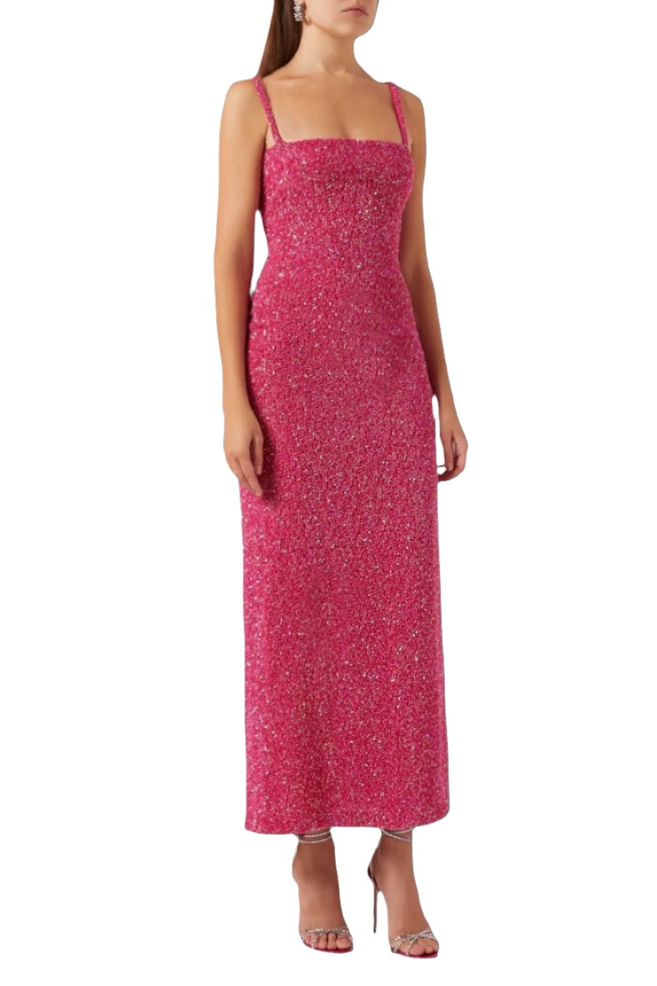 Front view of Luciernaga dress in fuchsia on model with square neckline, slim straps, fitted column silhouette and subtle shimmer on white background