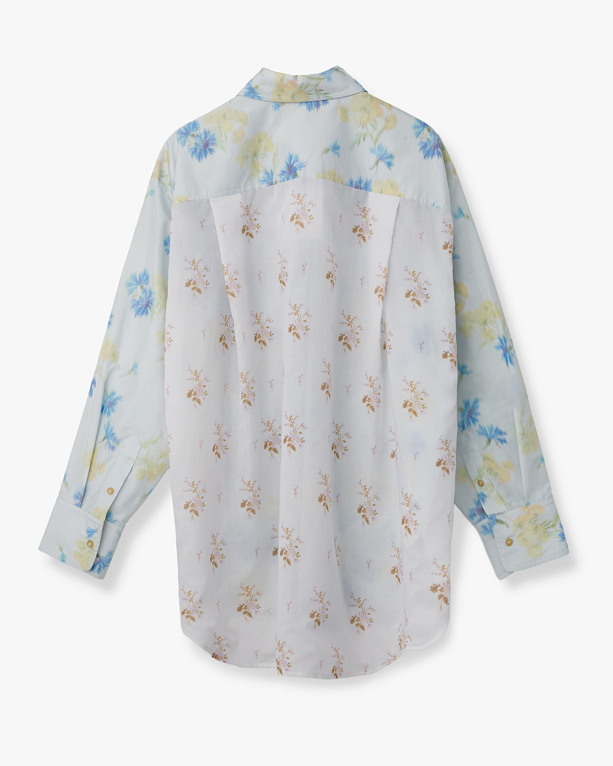Back view of Fidele Shirt showcasing soft floral cotton voile patchwork and oversized fit on a plain background
