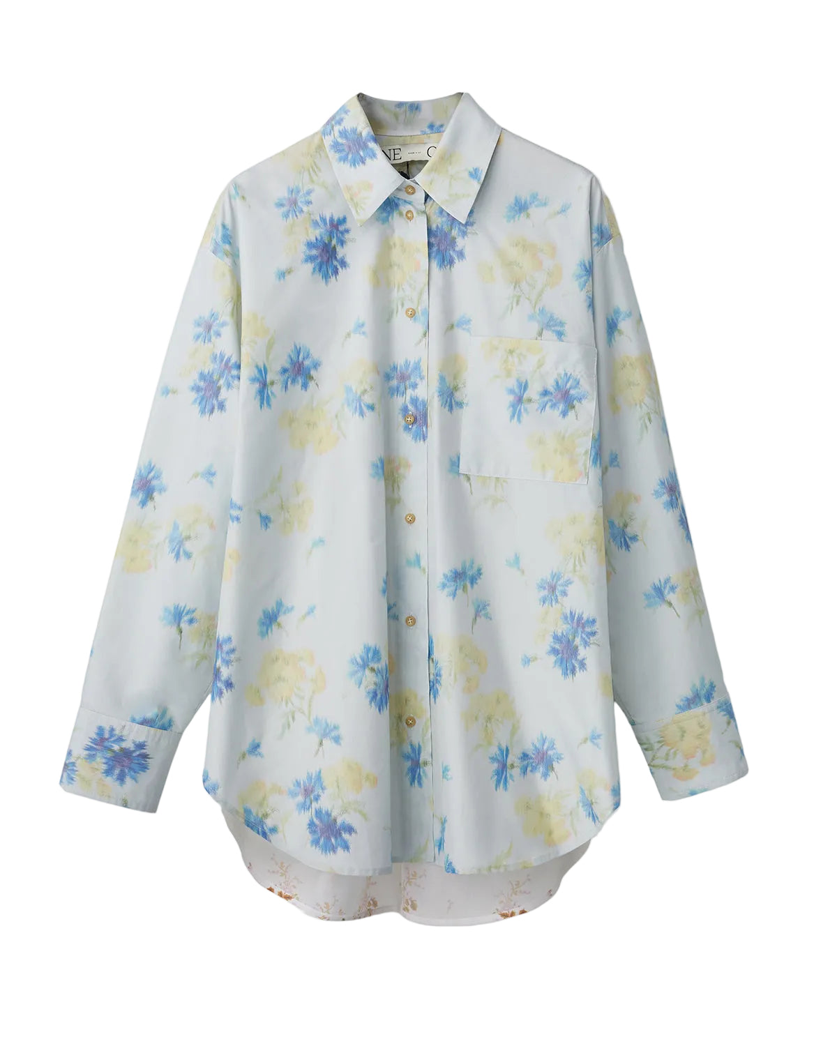 Front view of Fidele Shirt showcasing its oversized blue floral silk taffeta button-front with chest pocket on white background
