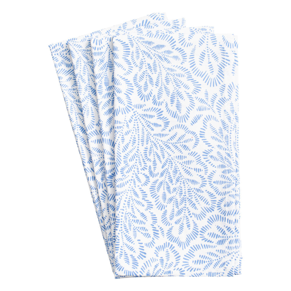 Front view of Block Print Leaves Cotton Dinner Napkins showcasing blue leaf print on white cotton with four napkins layered on white background