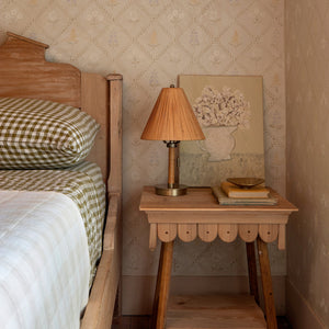 mini table lamp on side table next to bed