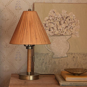 mini table lamp next to artwork