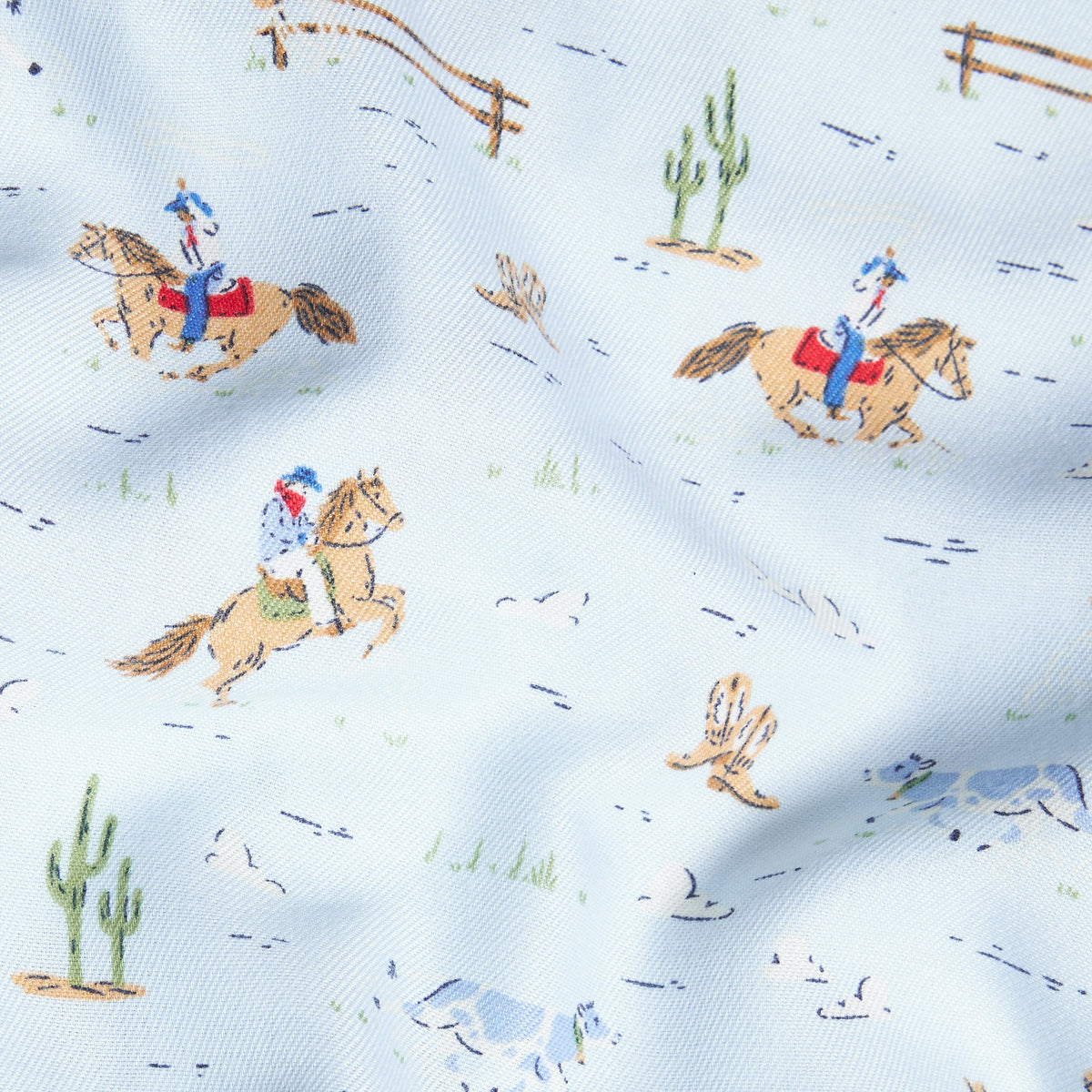 little english classic children's clothes cowboy print with light blue background for boys 