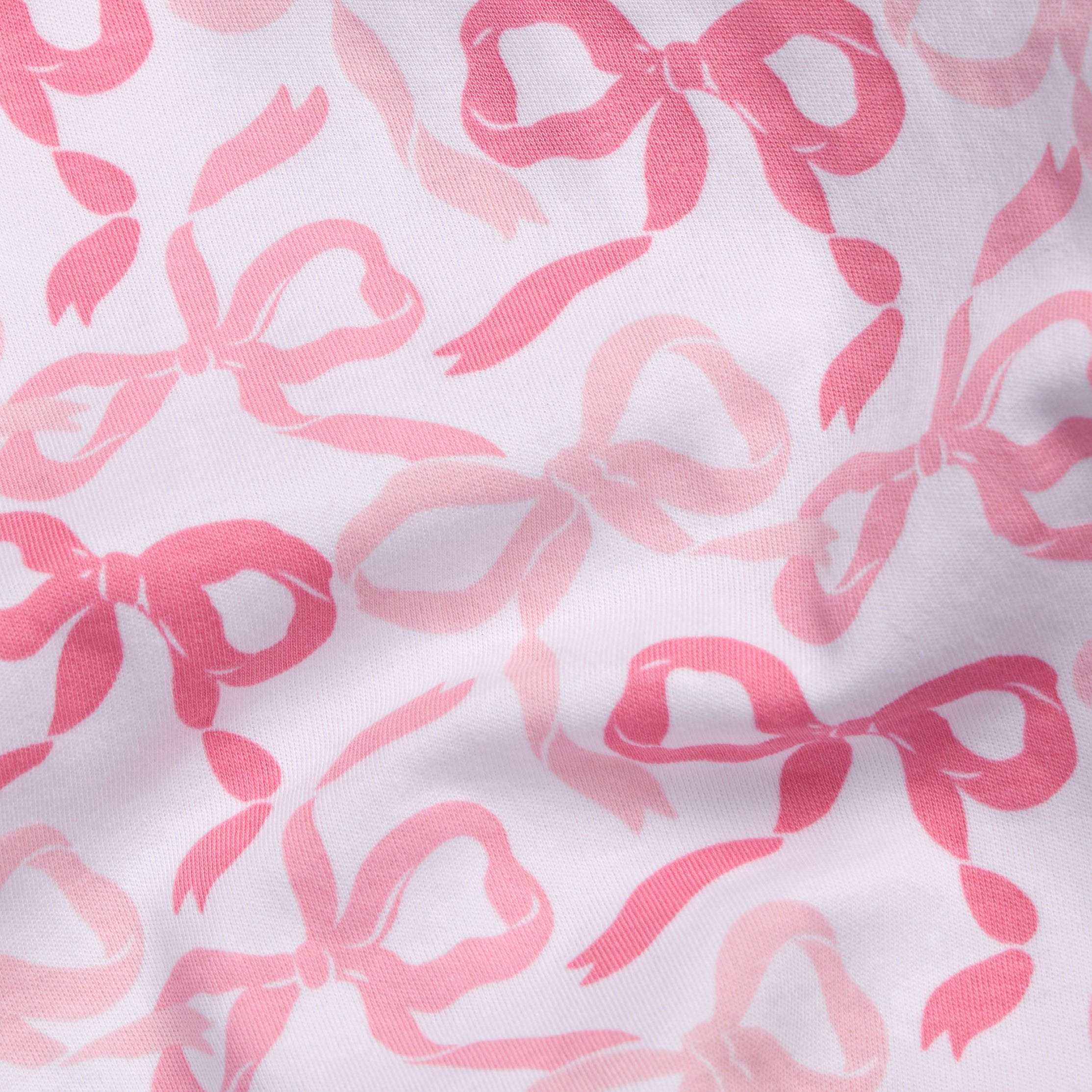 Little English classic children's clothing hot pink and light pink bows all over print with white background 