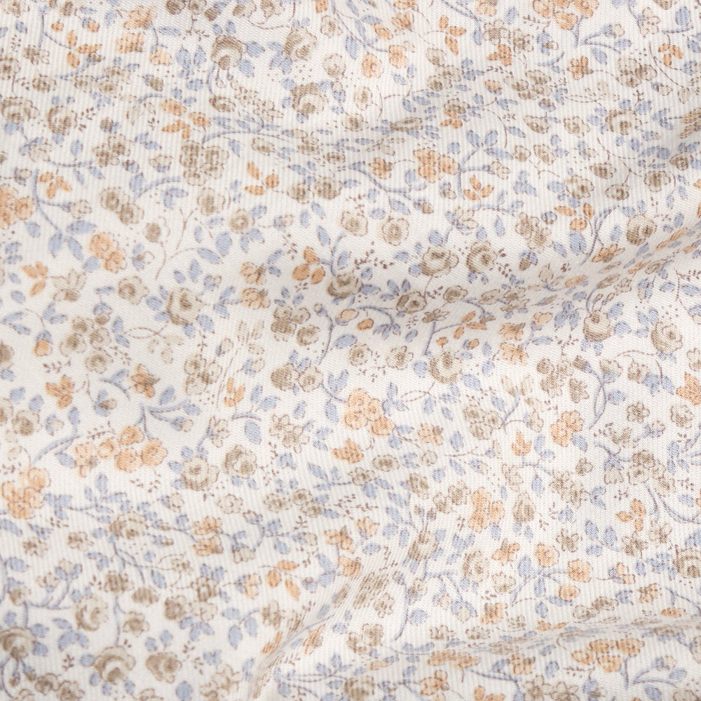 Winthrop Floral cream swatch with pale blue and tan floral pattern