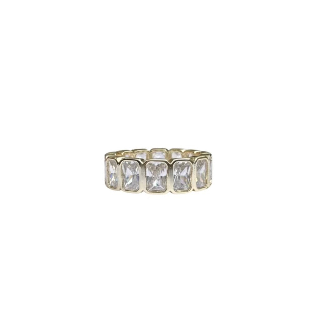 Front view of Grand Blanc Baguette Band showcasing repeated rectangular glass stones on a white background