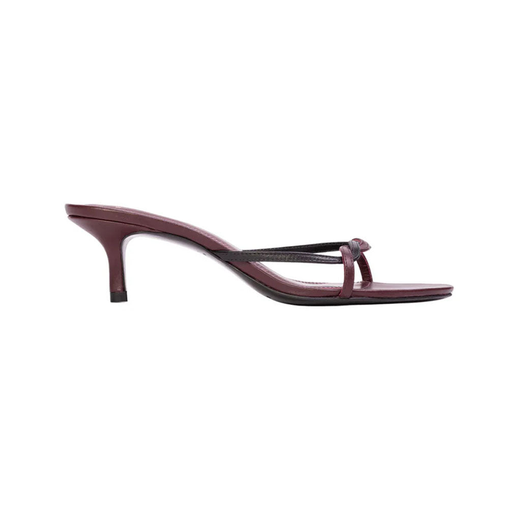 Side view of Fae 50 in Bordeaux Leather mule showcasing braided strap and curved low kitten heel on white background