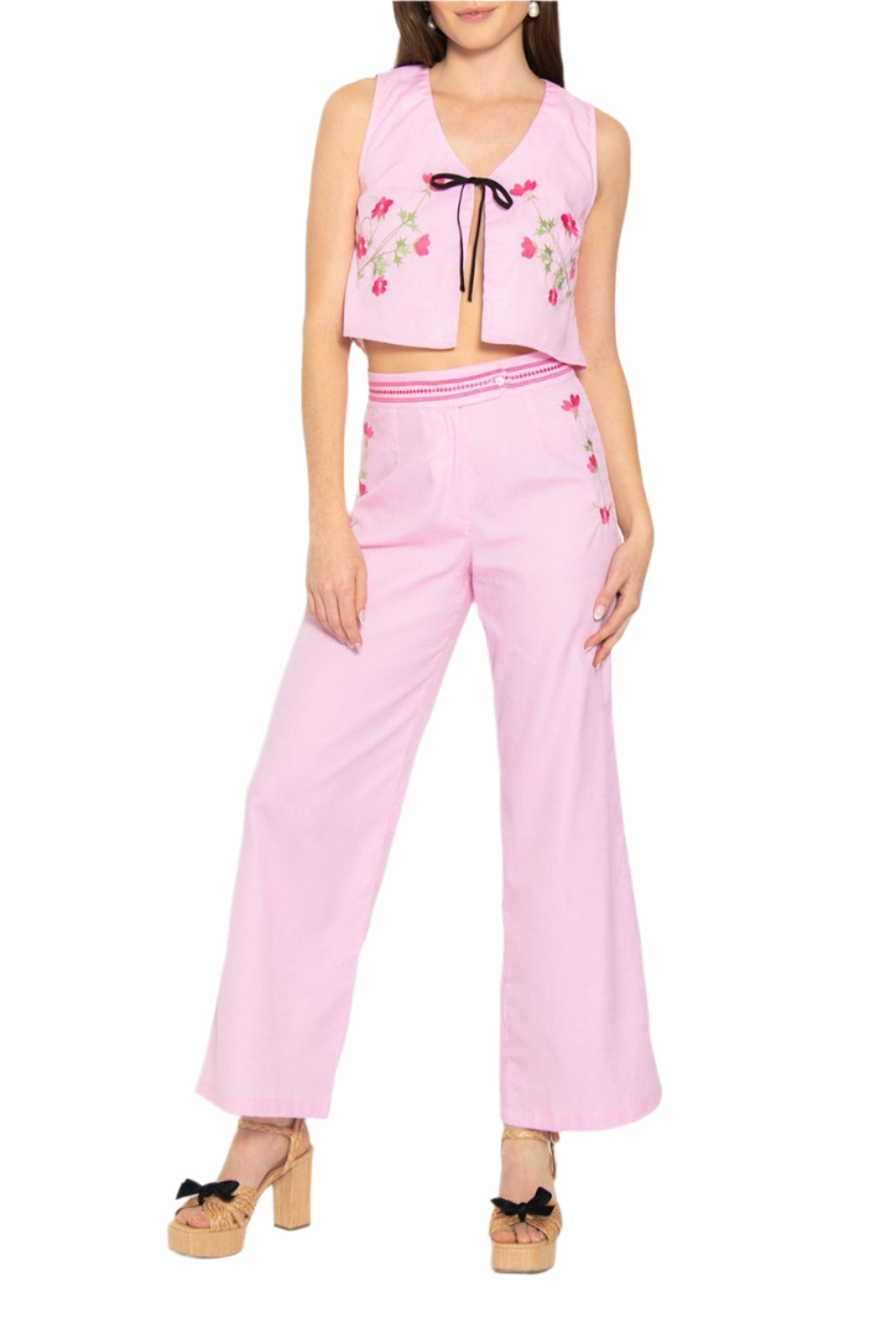 Front view of Betul Pants Set showcasing pink embroidered cropped vest with black tie and matching high-rise wide-leg pants