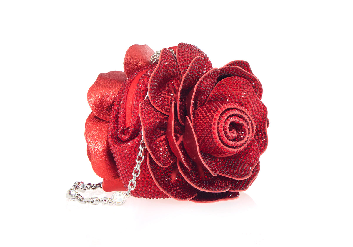 Close-up front view of the Soft Rose Belle Clutch showcasing its red sequined rose silhouette and chain strap against a white background