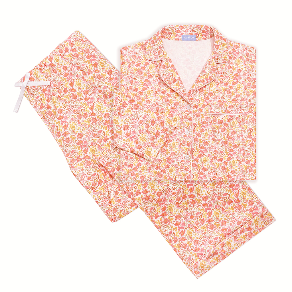 Top view of Marigolds women’s button-front long pajama set with floral print, collared top, and drawstring pants