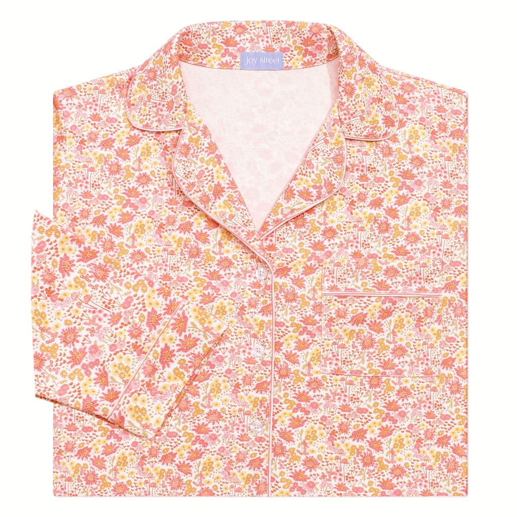Front view of Marigolds long pajama top showing hand drawn floral print, collared neckline, and chest pocket on white background