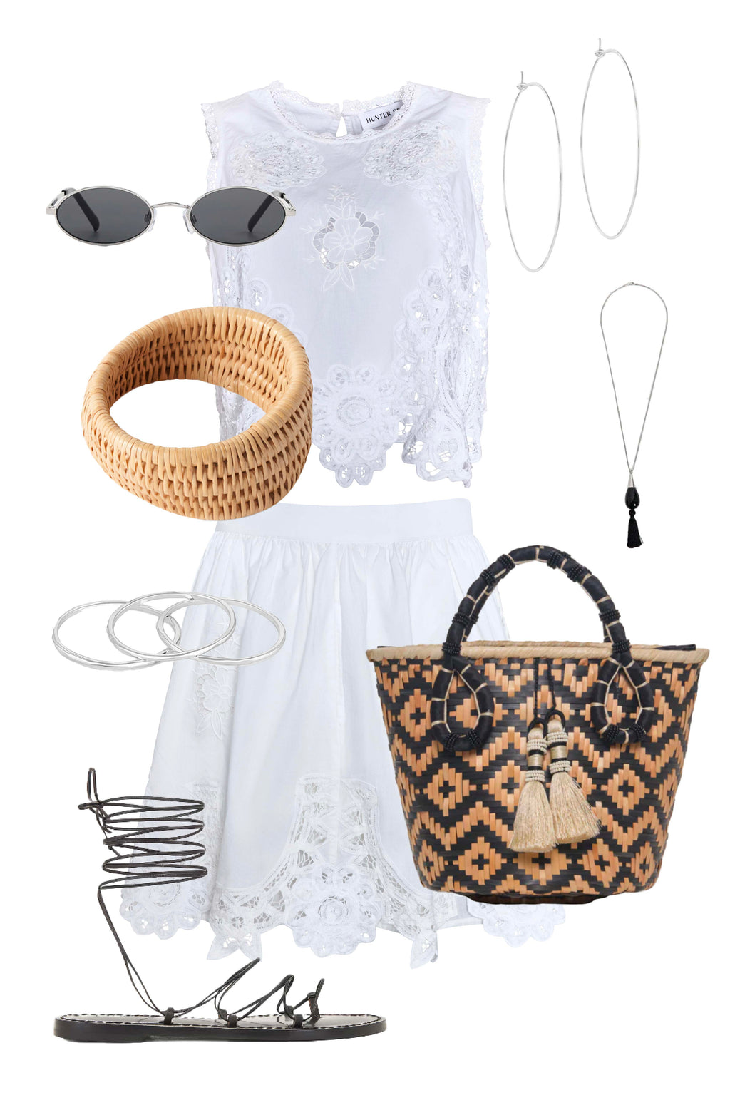 The Francesca Top in white lace has a cropped profile and sleeveless.