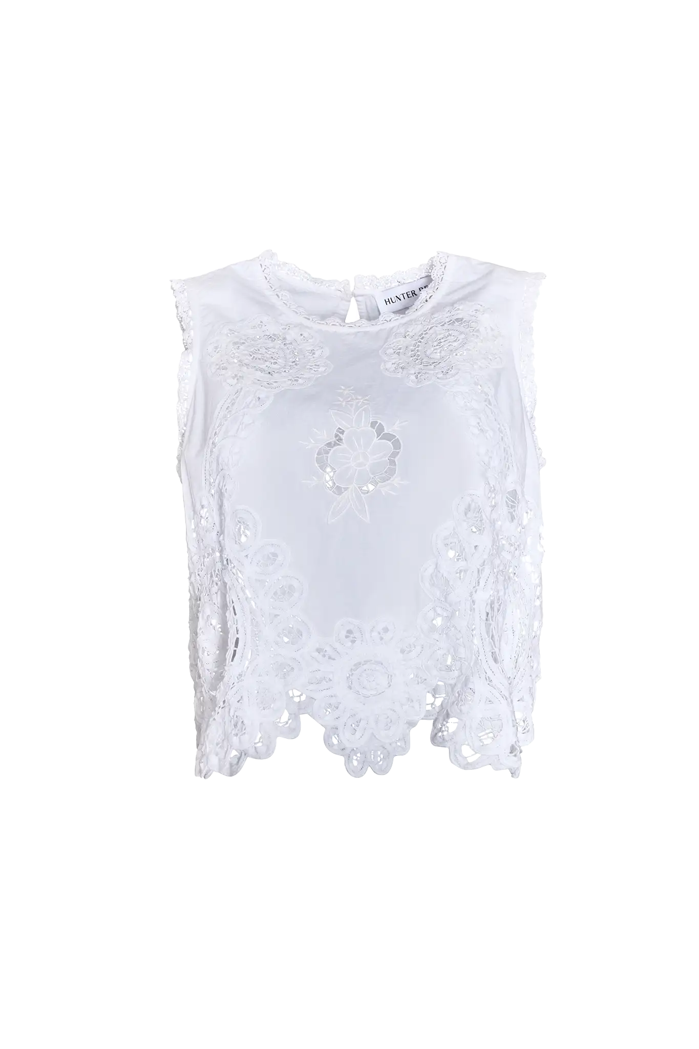 The Francesca Top in white lace has a cropped profile and sleeveless.