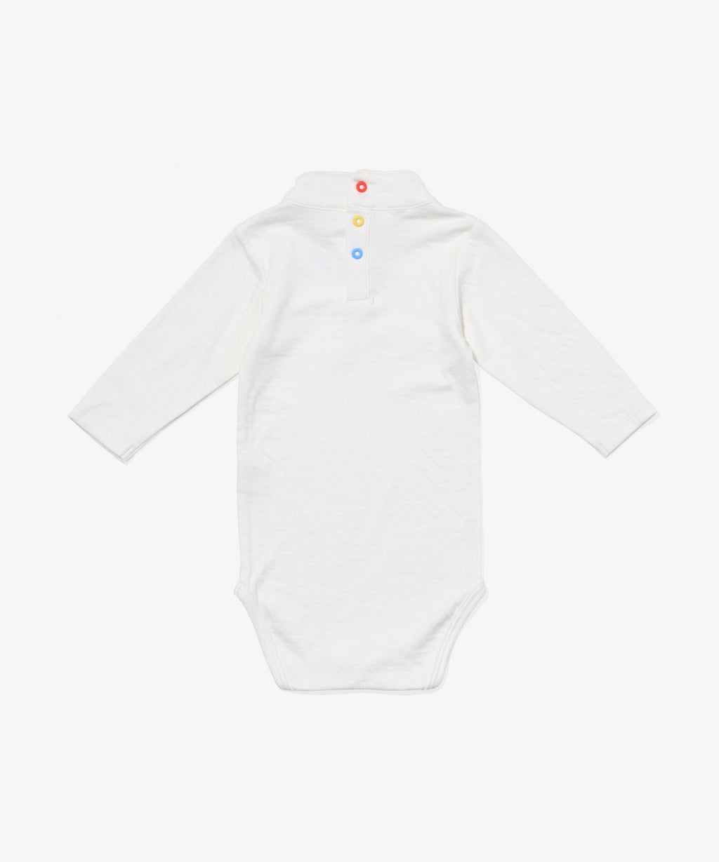 Frank T-Neck One-Piece in Vanilla Piping