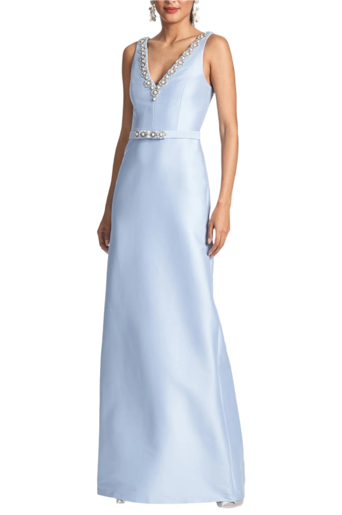 Front view of Garda Gown in Glacial Blue showcasing beaded V neckline and column silhouette with white background