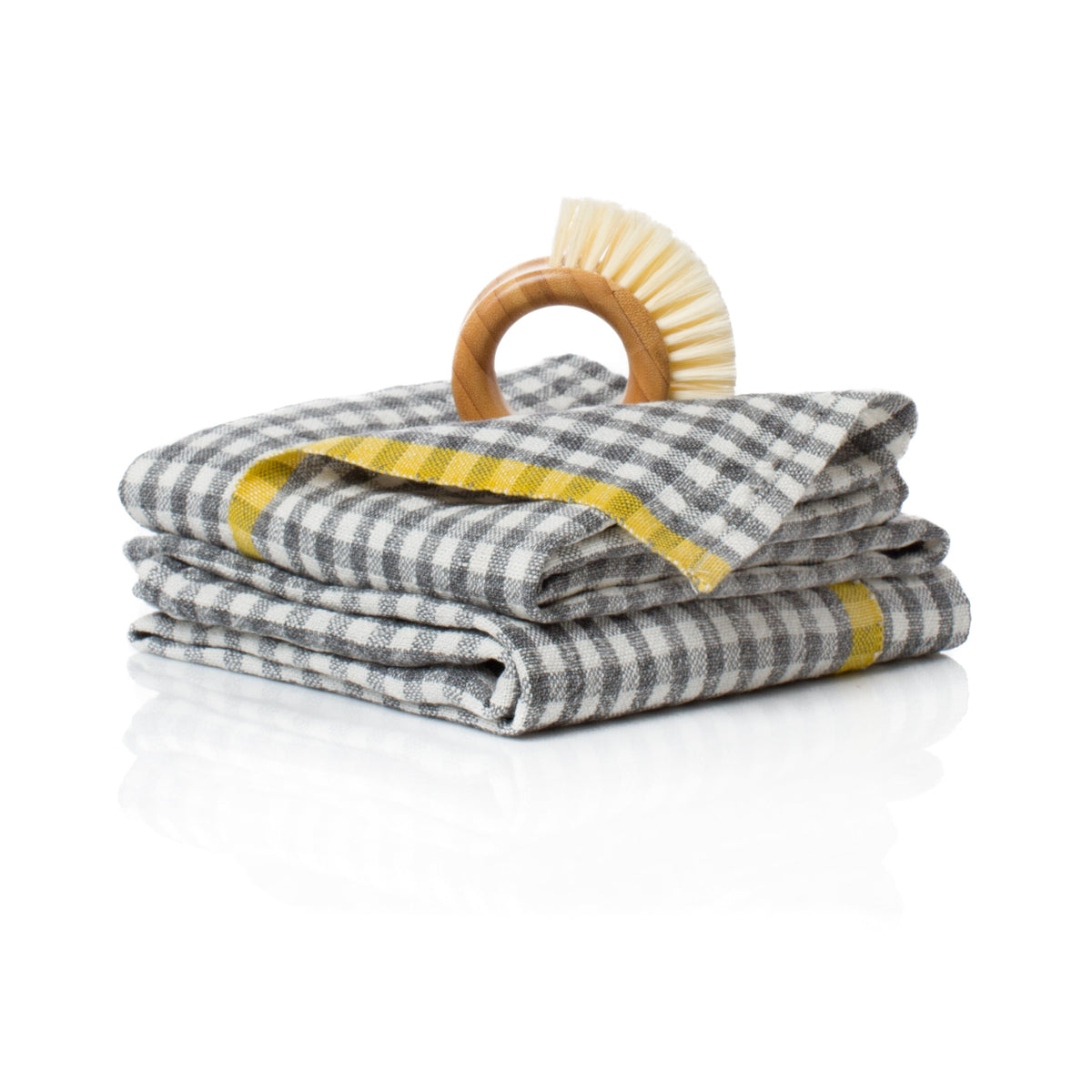Front view of Two-Tone Gingham Towels in Grey and Dijon, Set of 2 showcasing grey and Dijon checked linen on white