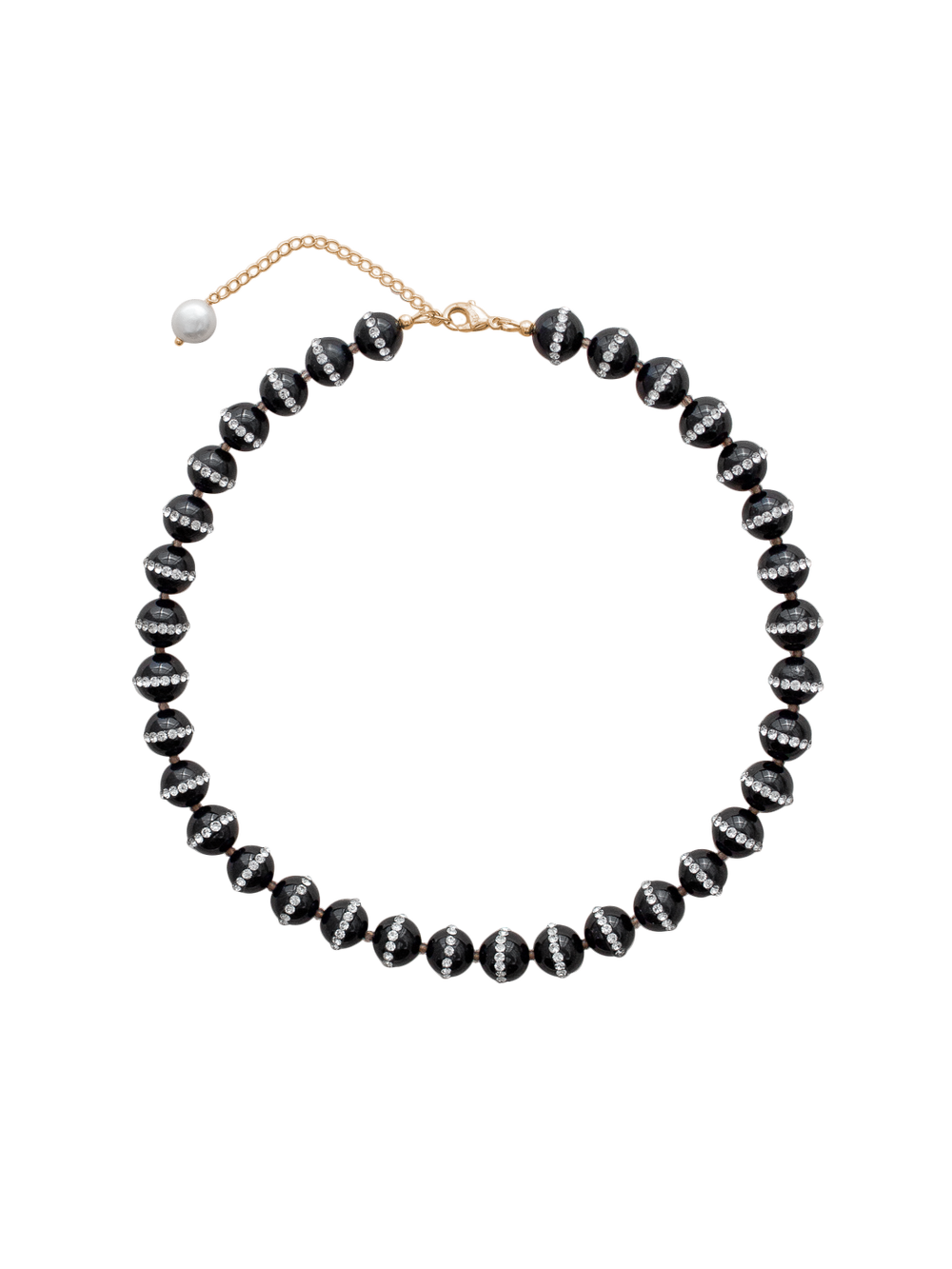 Top-down view of Gisele necklace in black showcasing faceted onyx beads with crystal band and gold-filled clasp on black