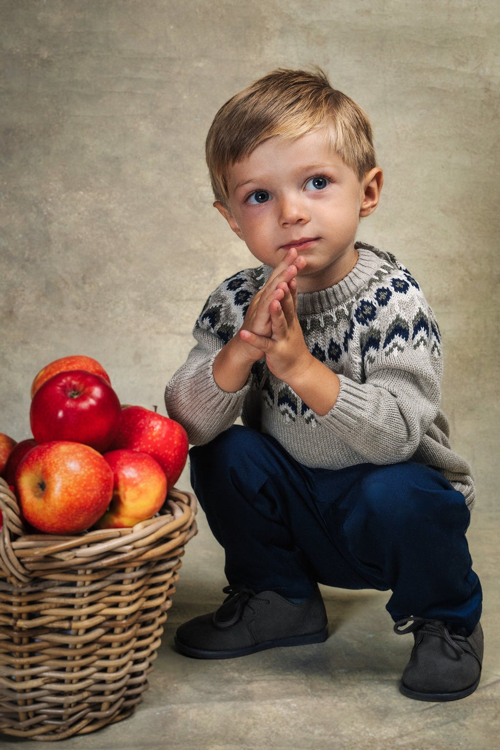 Front view of Nicolas Fair Isle Sweater in Ecru showcasing cream and navy Fair Isle knit pattern on a child