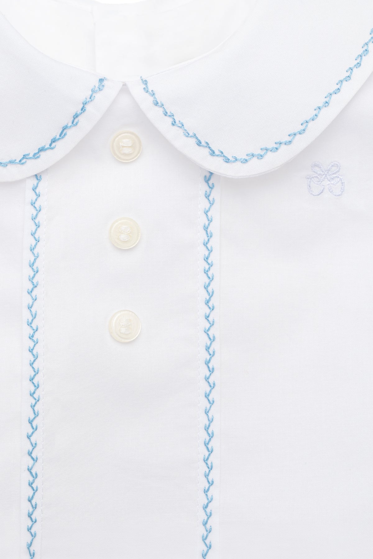 Close-up front view of Eduardo Shirt in Bluebell showcasing Peter Pan collar and herringbone embroidery on a white background
