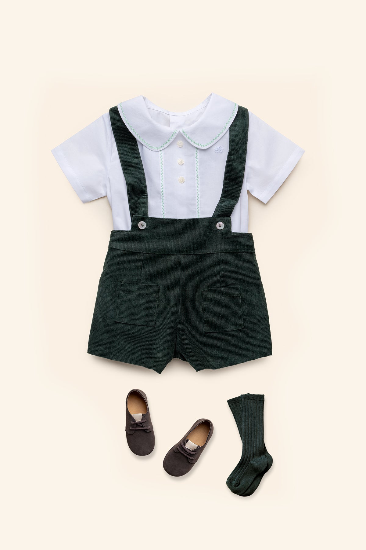 Front view of Eduardo Shirt in Olive showcasing Peter Pan collar, short sleeves, and herringbone embroidery on a plain background