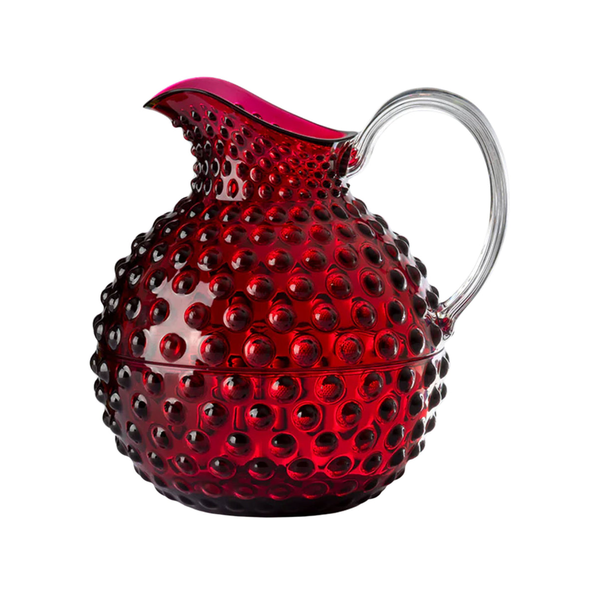Three-quarter view of Gene Krupa acrylic pitcher with hobnail texture in ruby red and clear handle on white background