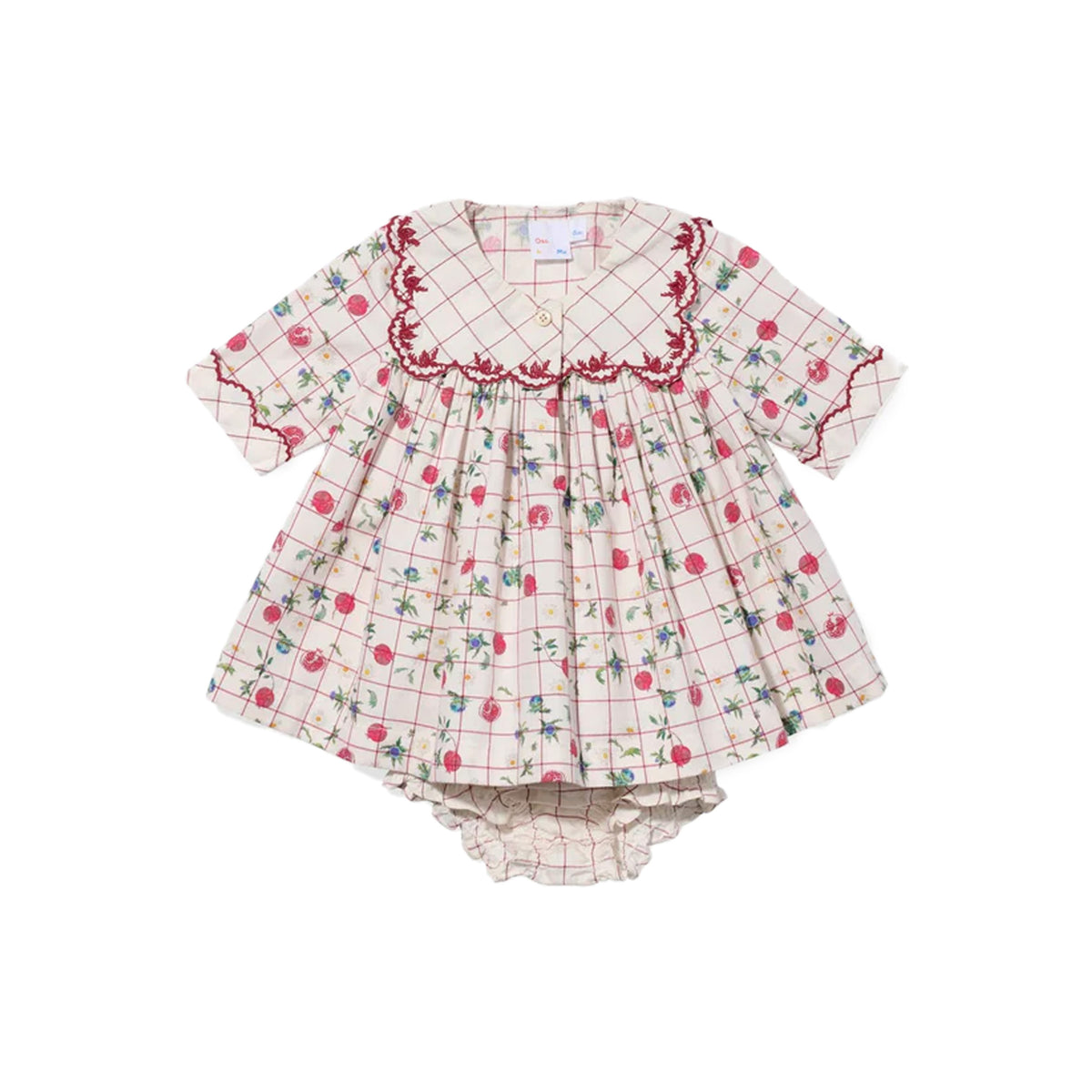 Front view of Gigi baby dress in Pomegranate Parade showcasing scalloped sailor collar and matching bloomers on white background