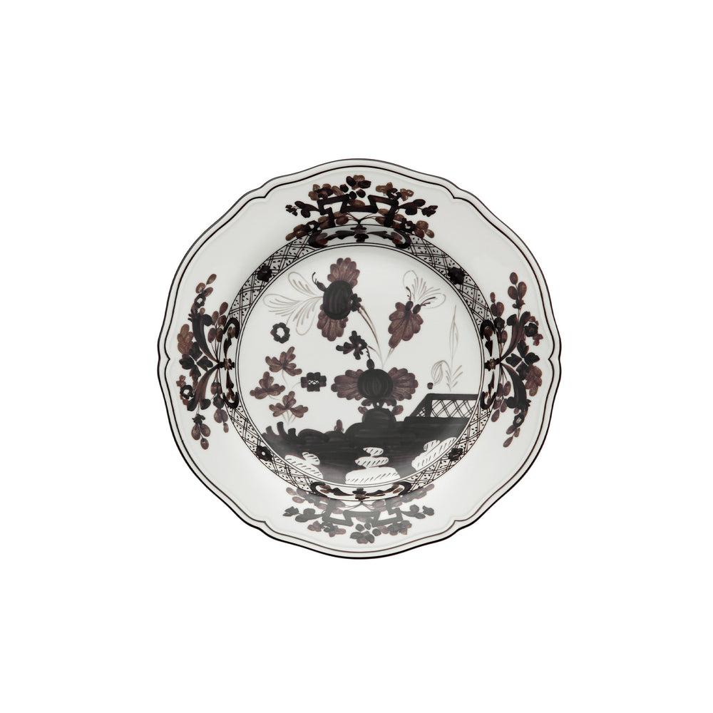 Top view of Oriente Italiano bread plate in Albus showcasing scalloped rim and brown floral motif on white porcelain