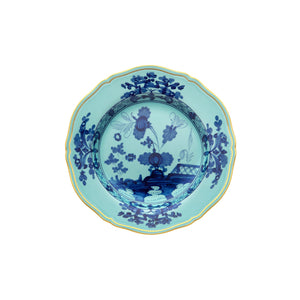 Top view of Oriente Italiano Bread Plate in Iris showcasing blue floral and scenic decoration with a white background