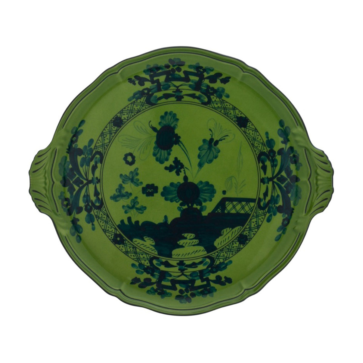 Top view of round cake plate with malachite green glaze and dark floral chinoiserie pattern, scalloped edge and side handles