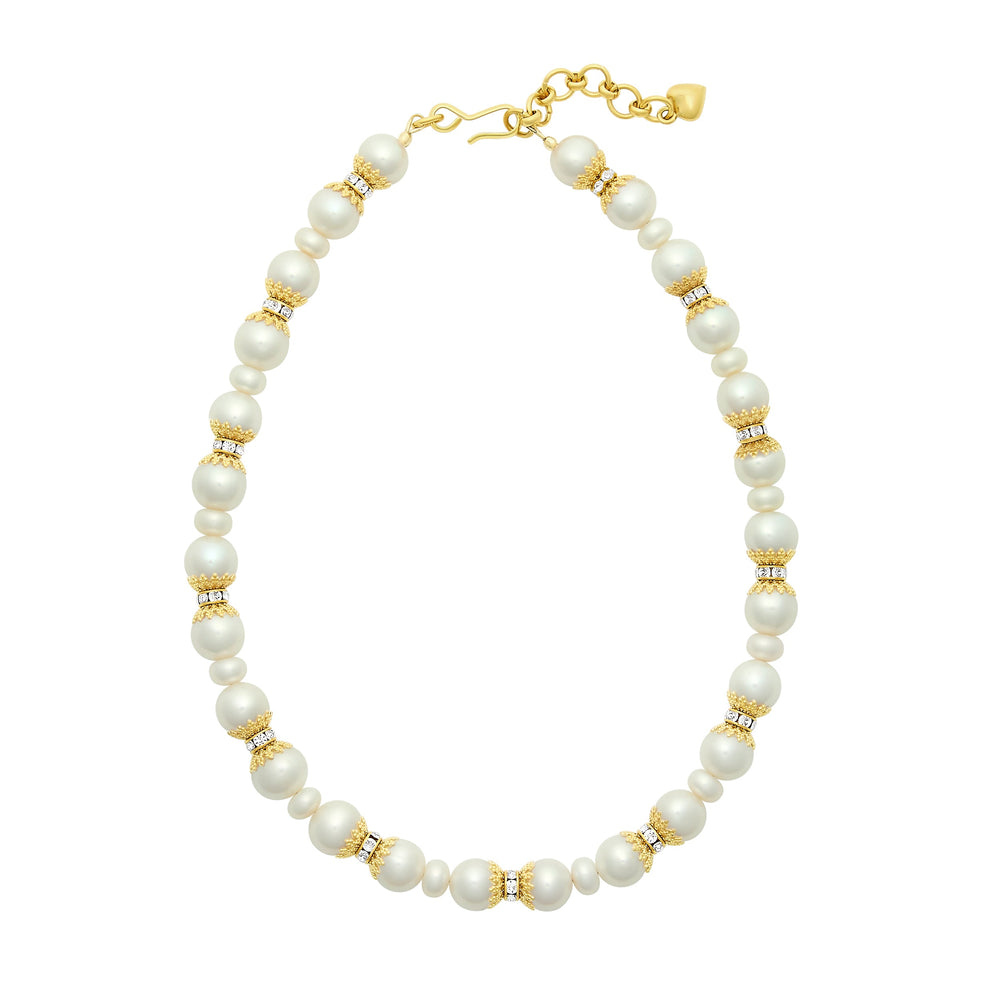 Top-down view of Gladys Necklace showing freshwater pearls and gold-plated beads with crystal rondelles on white background