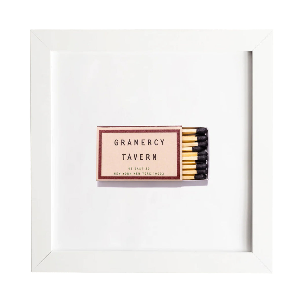 Front view of Gramercy Tavern matchbook framed print showcasing a centered vintage matchbook in a white frame on a white background